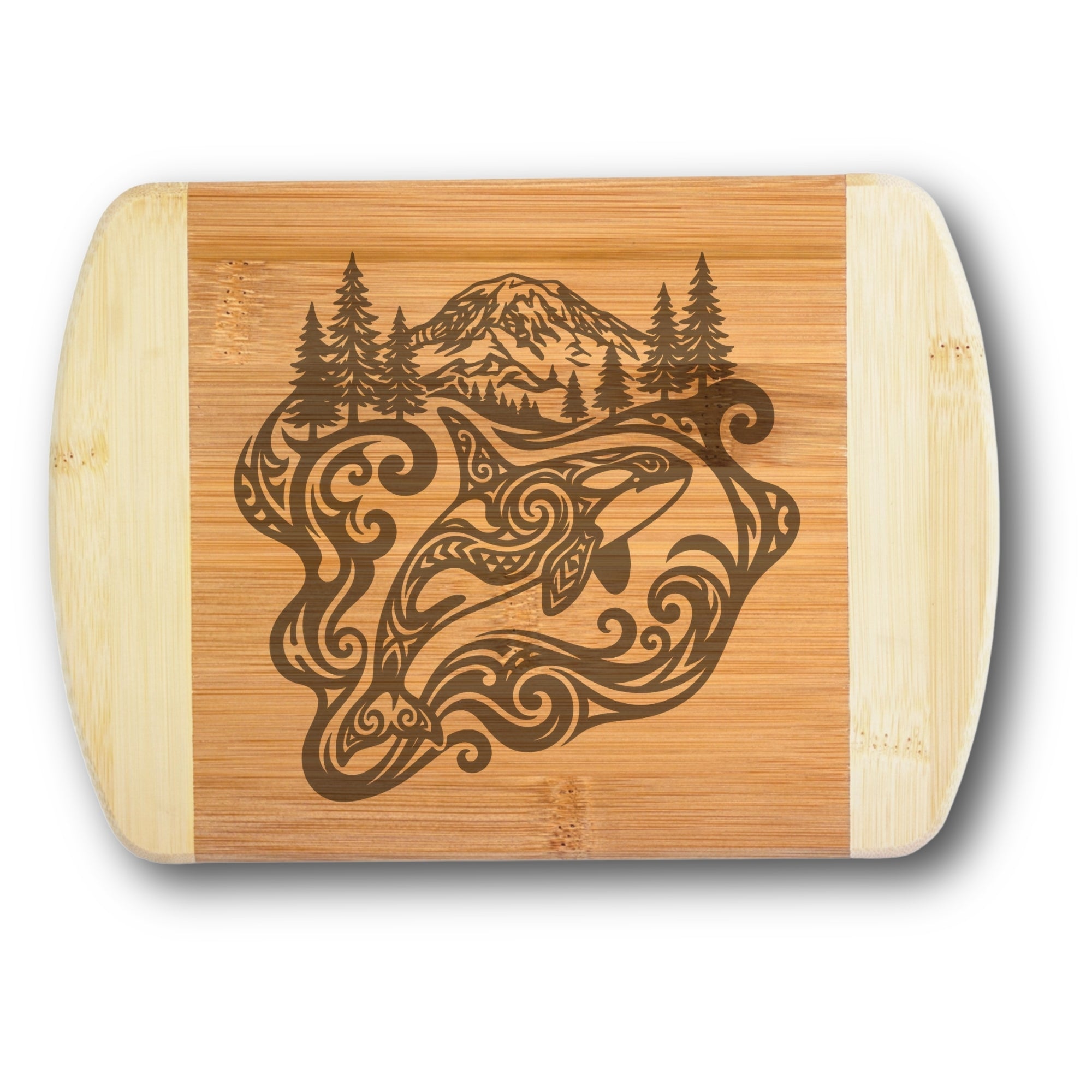 Wooden cutting board with laser-engraved design of an orca and mountain rainier on a white background