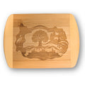 A premium engraved bamboo cutting board featuring "The Roots" local illustration of the Agate Pass Bridge, a Washington State Ferry, and a Great Blue Heron bird, handcrafted by The Blended Oasis in Suquamish, Washington.