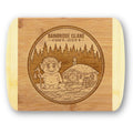 A premium engraved bamboo cutting board featuring "The Island Troll" emblem showcasing a friendly troll with a lantern, a hobbit house with a waterwheel, and Bainbridge Island coordinates, handcrafted by The Blended Oasis.