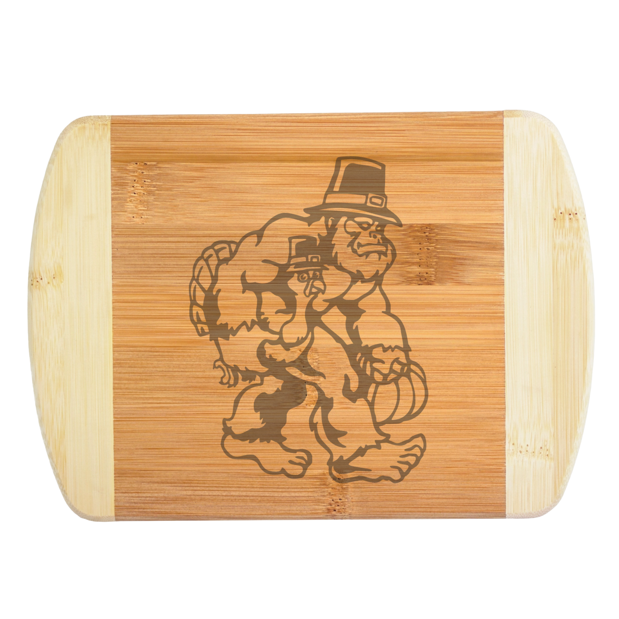 A premium engraved bamboo cutting board featuring a funny autumn illustration of Bigfoot wearing a buckled hat while carrying a turkey and a pumpkin, handcrafted by The Blended Oasis in Washington State.
