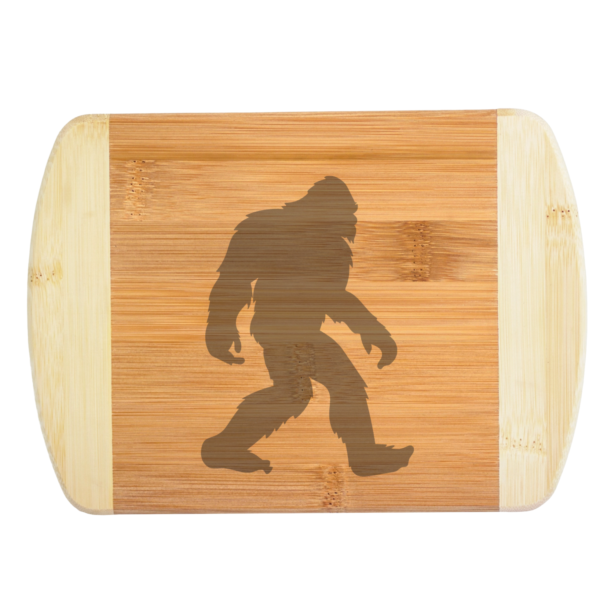 A premium engraved bamboo cutting board featuring the iconic classic silhouette illustration of a walking Bigfoot Sasquatch centered on the wood grain, handcrafted by The Blended Oasis in Washington State.