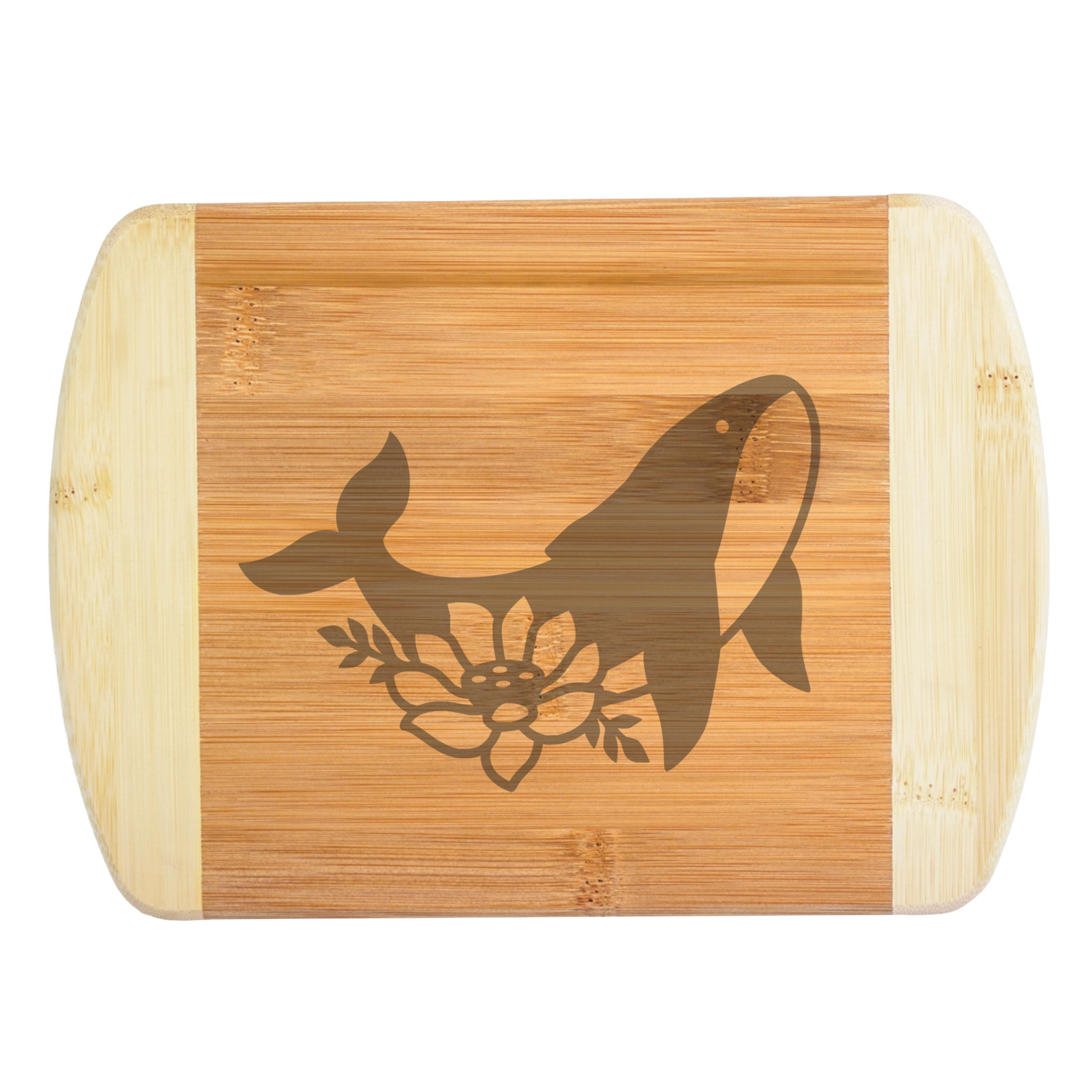 An elegant engraved bamboo cutting board featuring a unique artistic design of a whale silhouette paired with a blooming lotus flower, handcrafted by The Blended Oasis in Washington State.