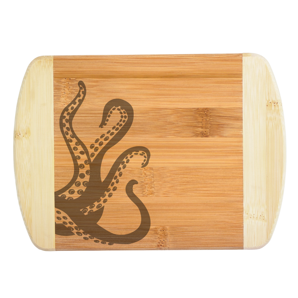 warmly engraved kraken tentacles octopus custom bamboo cutting board the blended oasis
