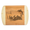 A premium engraved bamboo cutting board featuring an intricate design of Washington State filled with mountains, evergreen trees, a sparrow, a wildflower, and a leaping orca whale, handcrafted by The Blended Oasis in Washington State.
